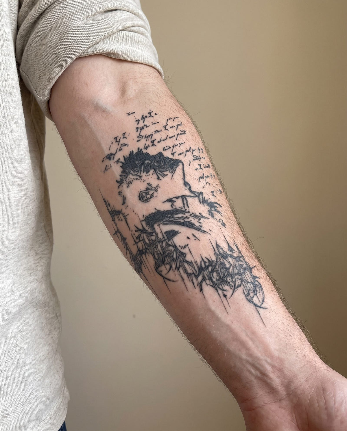 Beast Of Darkness Script semi-permanent tattoo on forearm