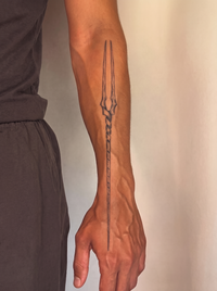 Genesis Spear semi-permanent temporary tattoo