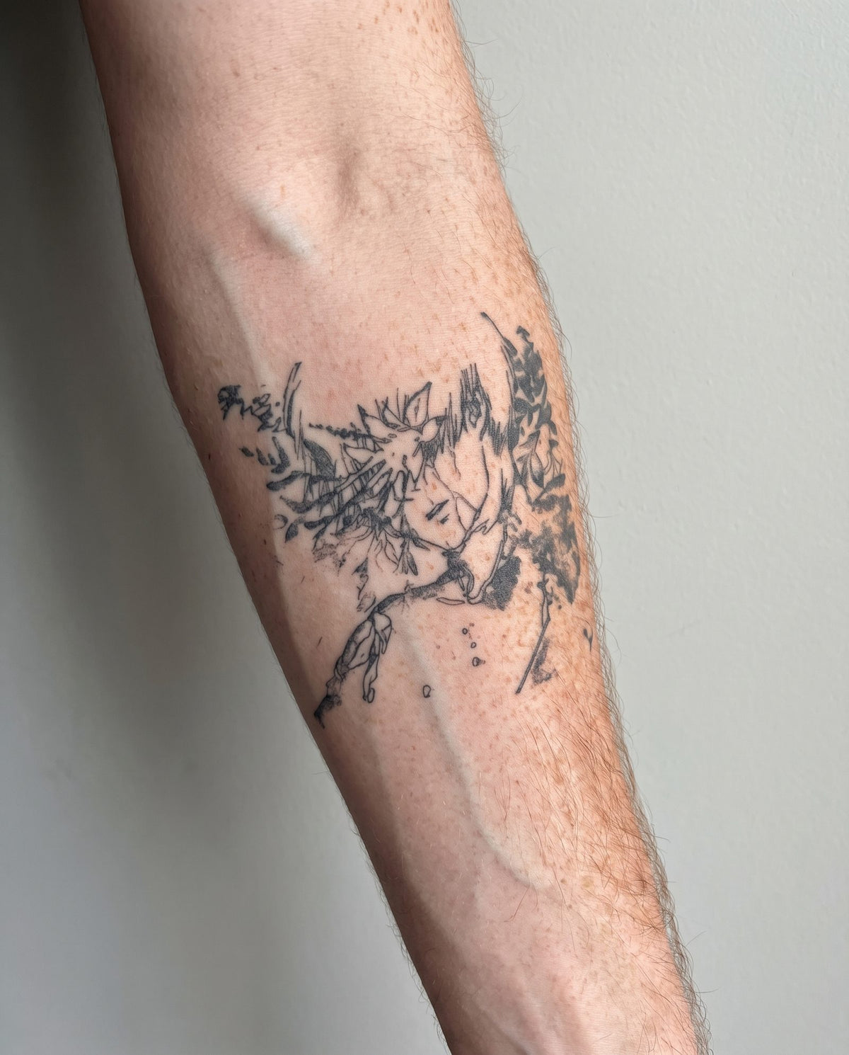 Kaneki semi-permanent tattoo on inner forearm